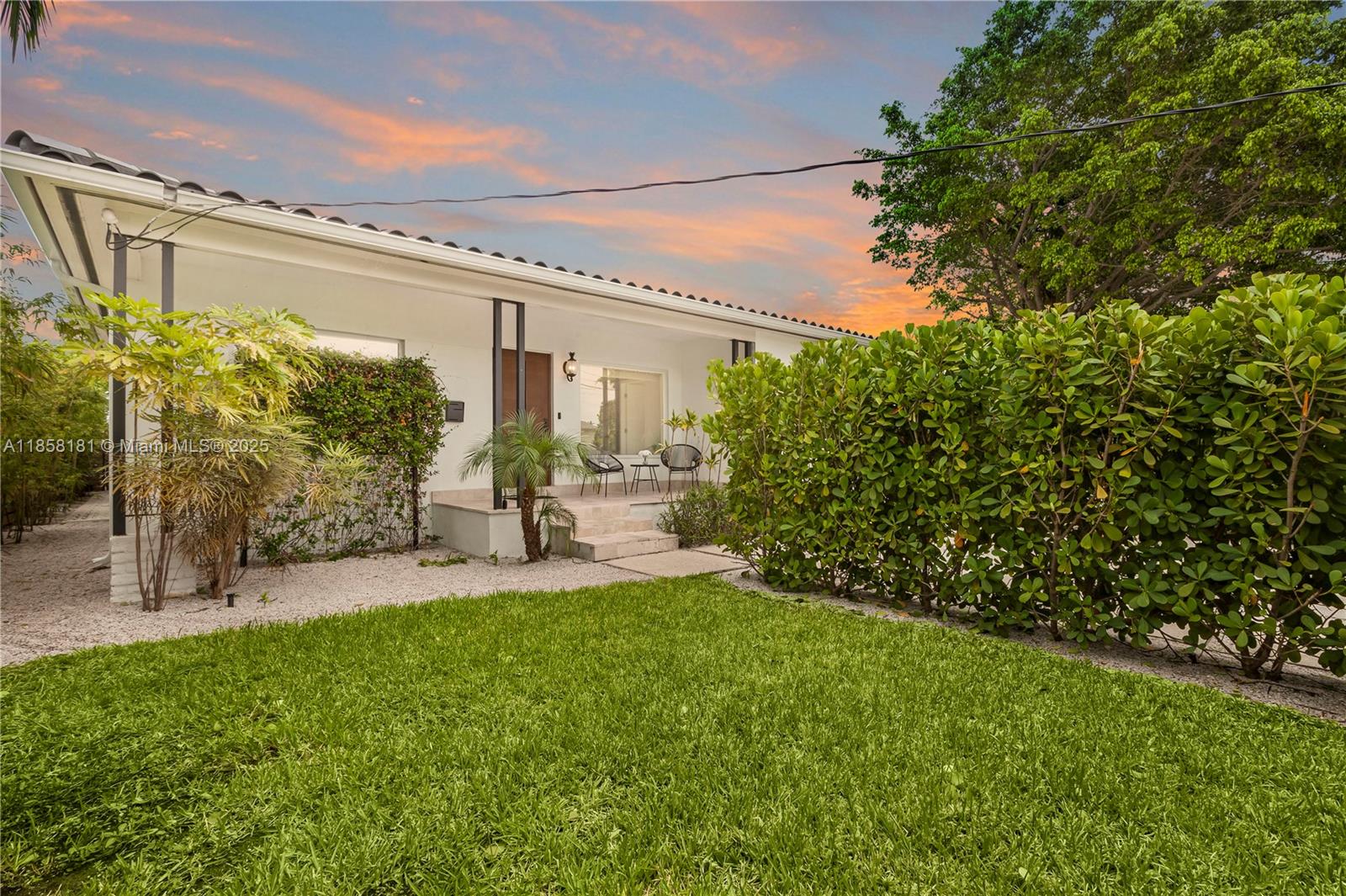 9065 Emerson Avenue Surfside, FL 33154 - Photo 44 of 50 a view of yard with patio