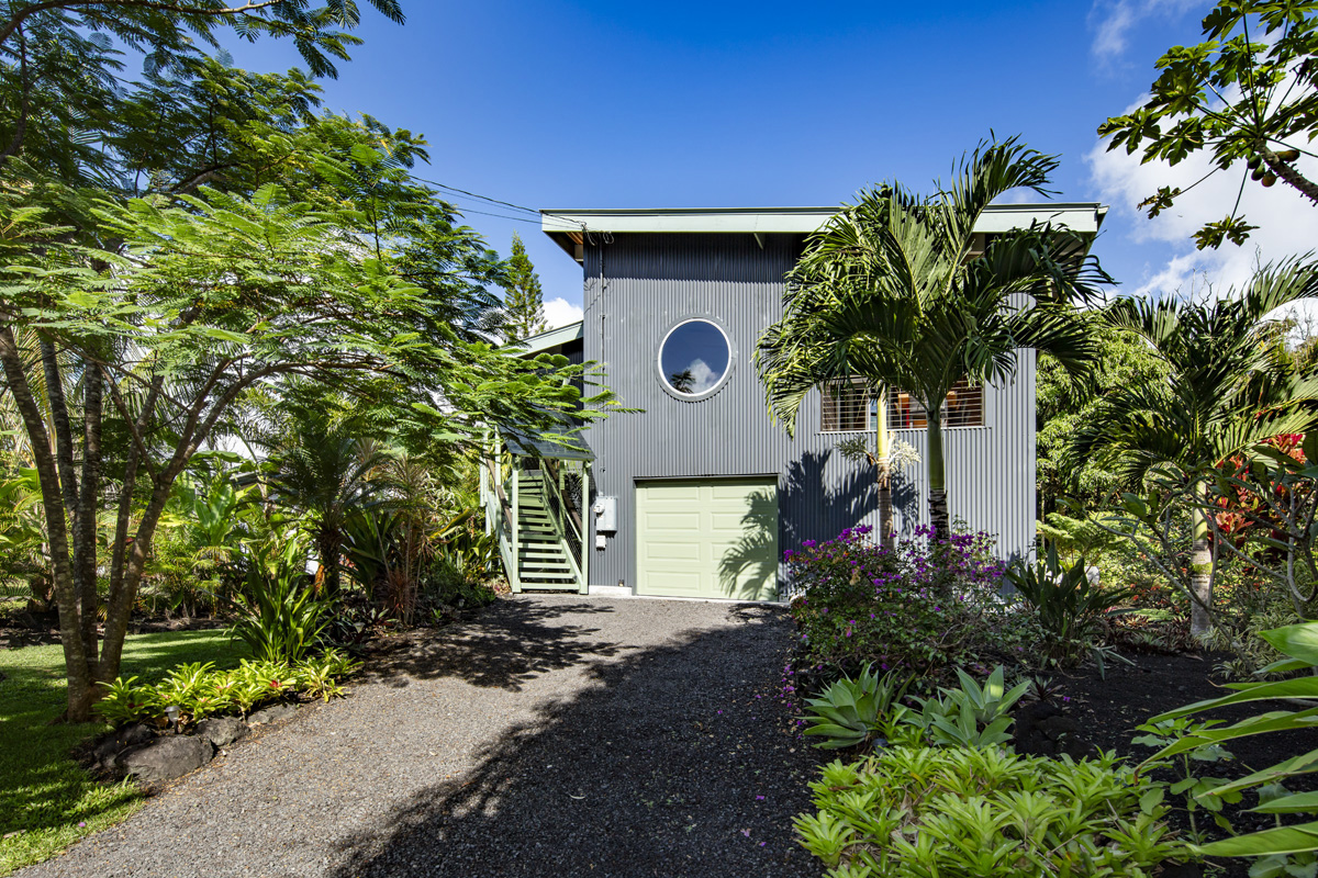 12-7002 Ho'Eunalu Street Pahoa, HI 96778 - Photo 1 of 26 a front view of a house with a yard