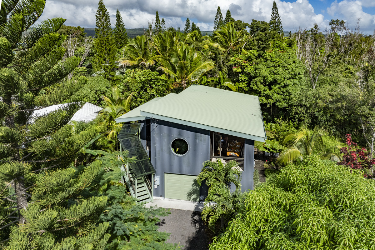 12-7002 Ho'Eunalu Street Pahoa, HI 96778 - Photo 2 of 26 view of a backyard with plants