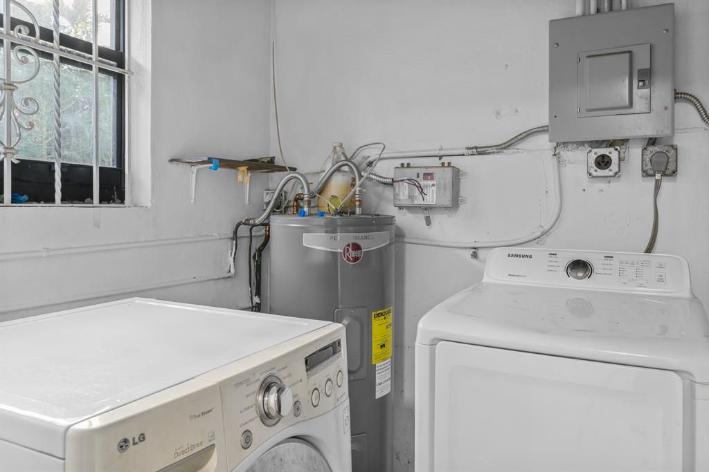 14800 Northeast 8th Court Miami, FL 33161 - Photo 12 of 37 a utility room with dryer and washer