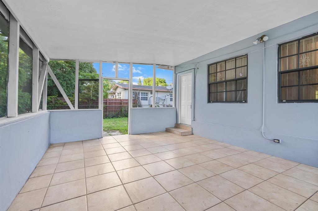 14800 Northeast 8th Court Miami, FL 33161 - Photo 20 of 37 a view of an empty room with a window