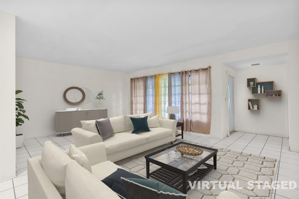 14800 Northeast 8th Court Miami, FL 33161 - Photo 22 of 37 a living room with furniture and a window
