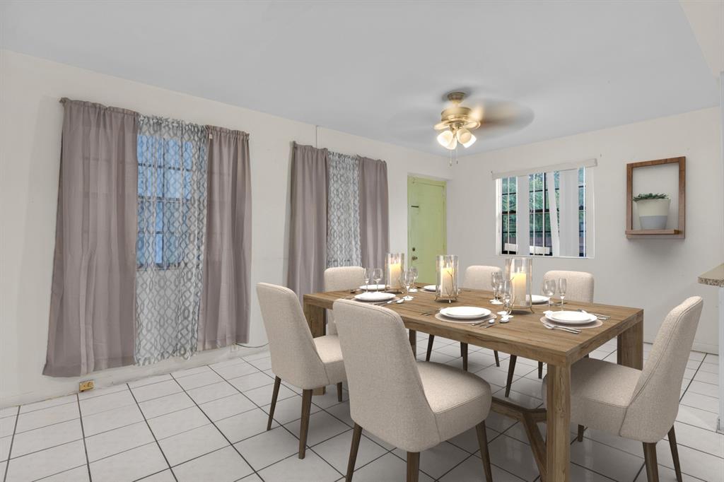 14800 Northeast 8th Court Miami, FL 33161 - Photo 23 of 37 a view of a dining room with furniture and chandelier