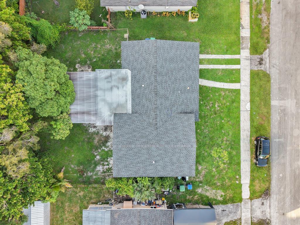 14800 Northeast 8th Court Miami, FL 33161 - Photo 36 of 37 an aerial view of a house with a yard and large tree