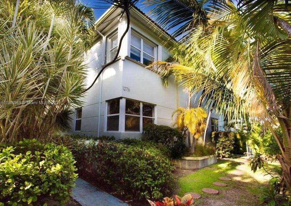 Normandy Isle Miami Beach, FL 33141 - Photo 13 of 13 a front view of a house with a yard