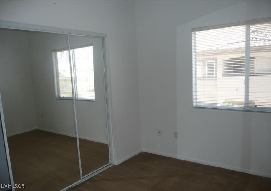 8725 West Flamingo Road, Unit 226 Las Vegas, NV 89147 - Photo 6 of 7 Unfurnished bedroom with a closet and baseboards