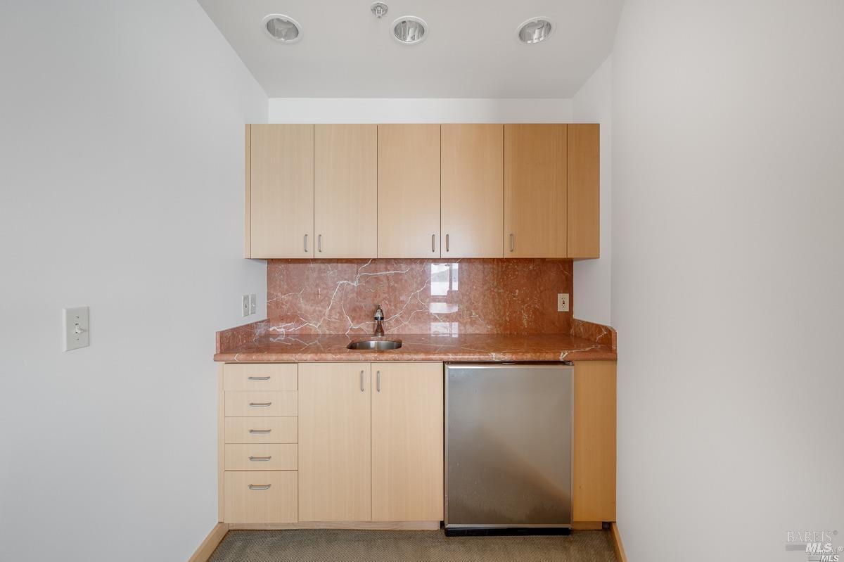 599 Bridgeway Sausalito, CA 94965 - Photo 18 of 37 a view of cabinets with wooden floor
