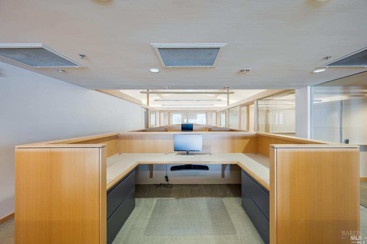 599 Bridgeway Sausalito, CA 94965 - Photo 23 of 37 a large white kitchen with a large window