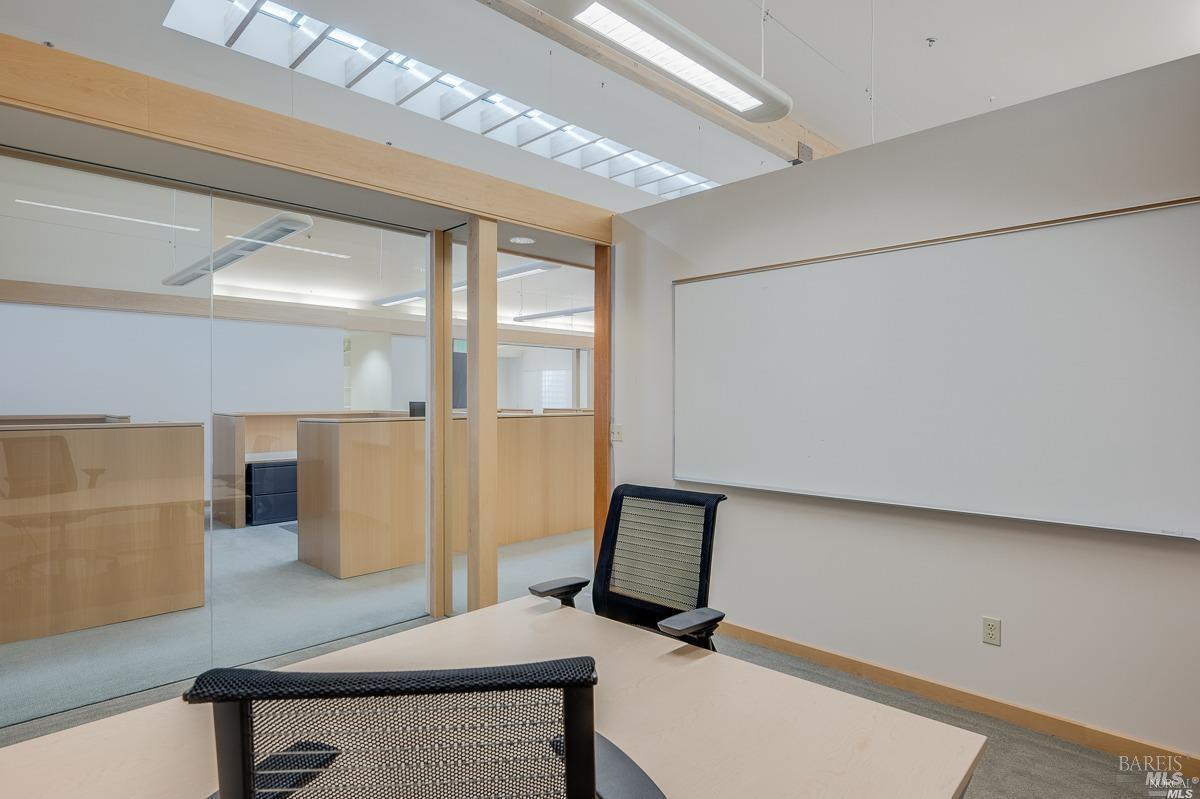 599 Bridgeway Sausalito, CA 94965 - Photo 29 of 37 a view of a hallway with workspace