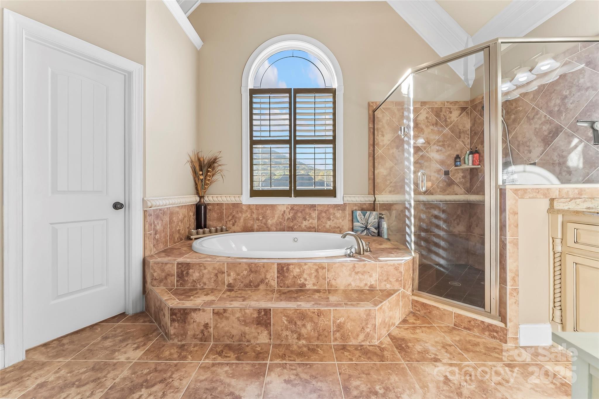 5836 Bakers Point Hickory, NC 28602 - Photo 18 of 48 a bath tub sitting in a bathroom next to a window