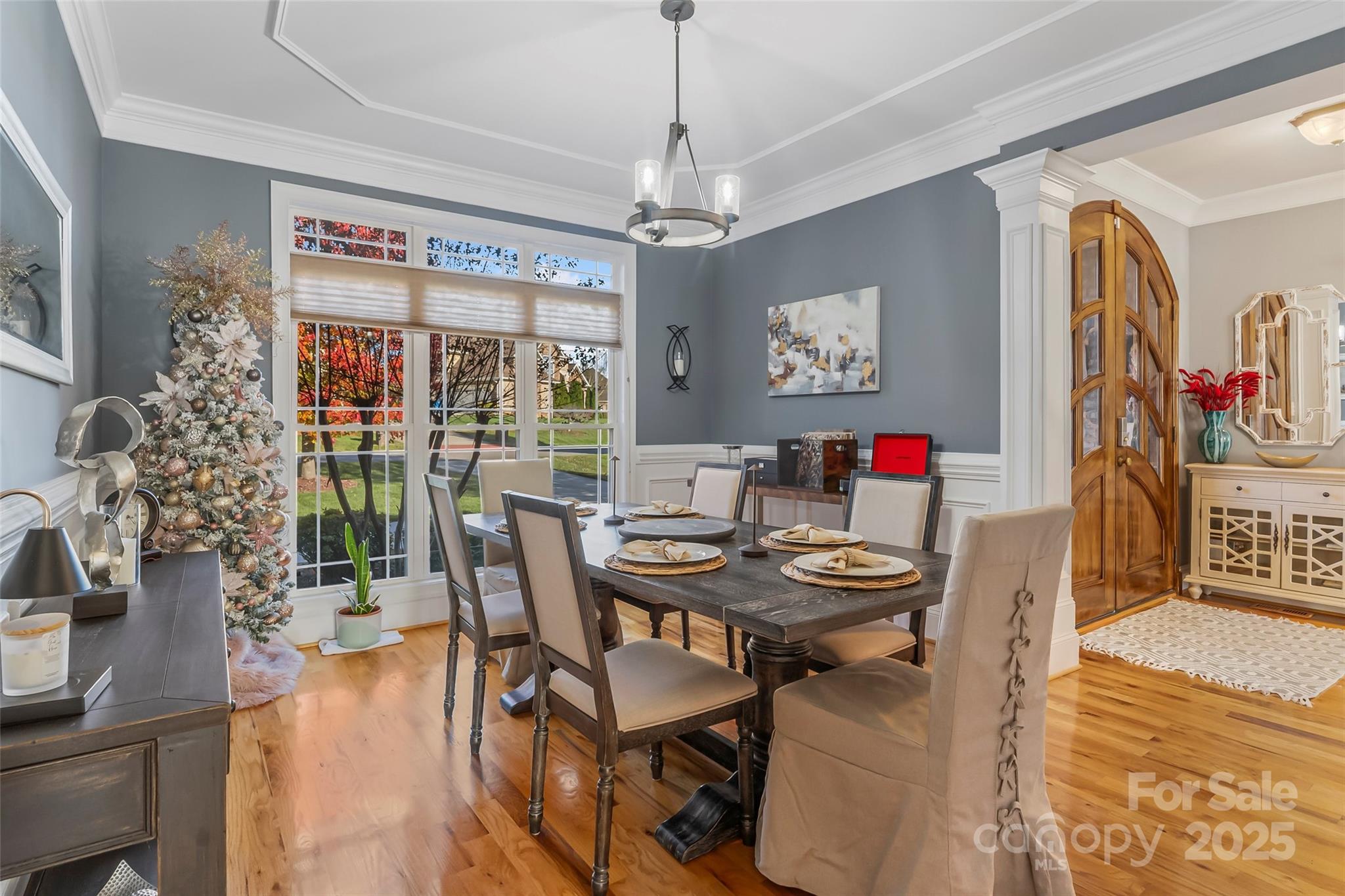 5836 Bakers Point Hickory, NC 28602 - Photo 20 of 48 a view of a dining room with furniture large window and wooden floor