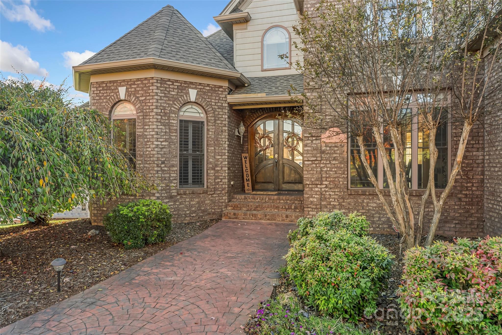 5836 Bakers Point Hickory, NC 28602 - Photo 2 of 48 front view of a house with a yard