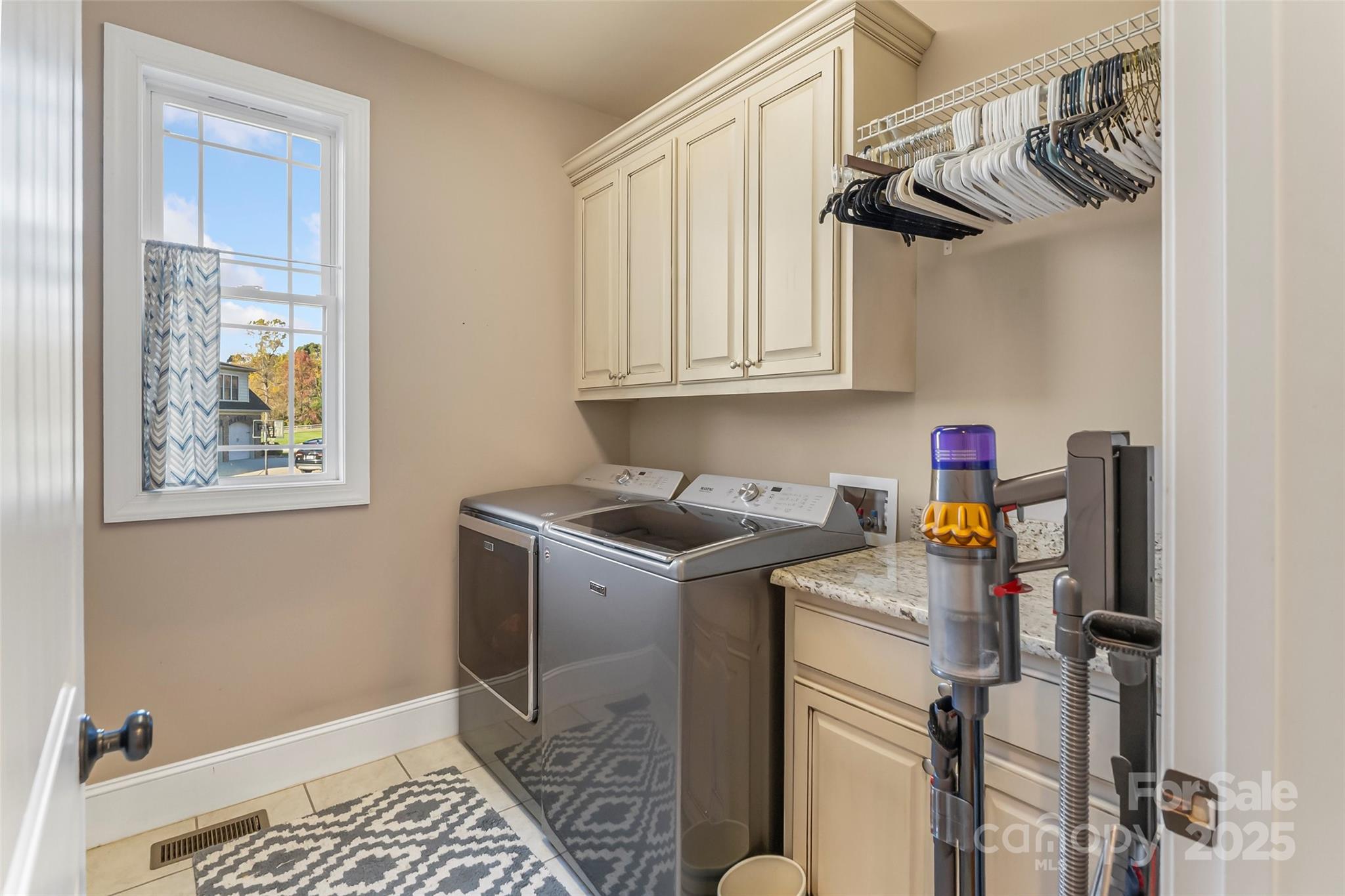 5836 Bakers Point Hickory, NC 28602 - Photo 23 of 48 a utility room with cabinets
