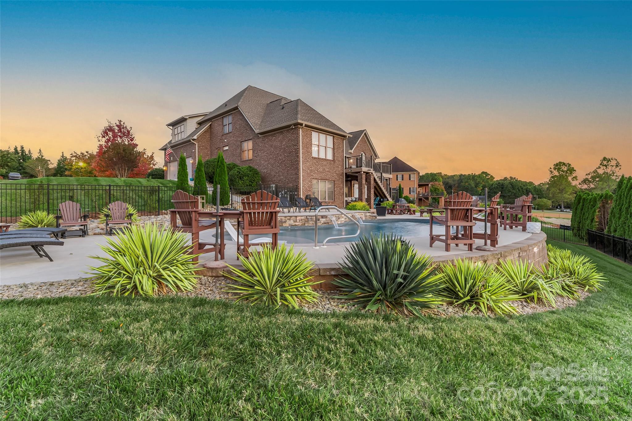 5836 Bakers Point Hickory, NC 28602 - Photo 3 of 48 a view of a chairs and table in the patio