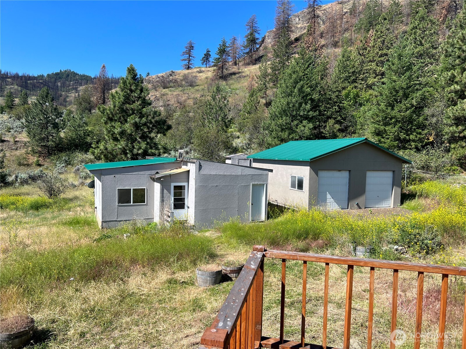 113 Eagles Bluff Road Oroville, WA 98844 - Photo 21 of 33 a view of front of house with a yard