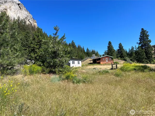 a view of a houses from a yard