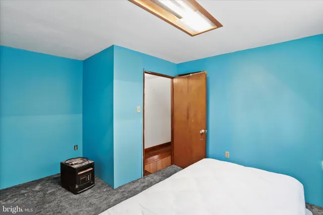 a view of a livingroom with stairs