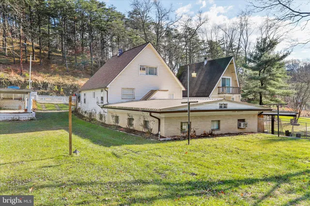 a view of a wooden door of the house