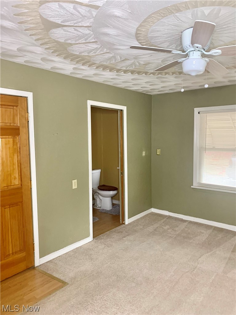 665 Dorchester Road Akron, OH 44320 - Photo 12 of 18 Carpeted empty room featuring ceiling fan