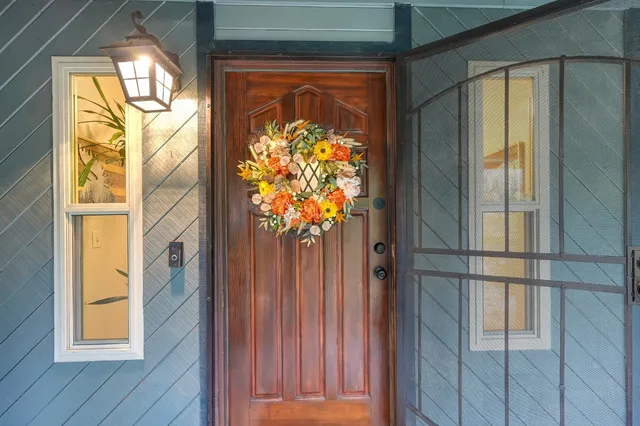 a view of house with yard