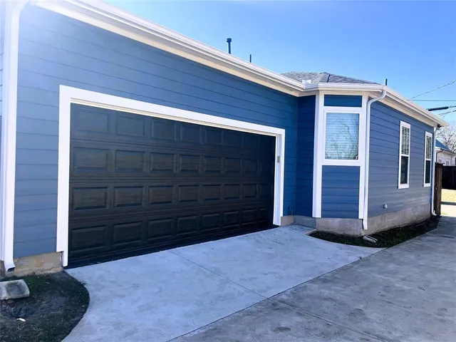 a view of outdoor space and garage