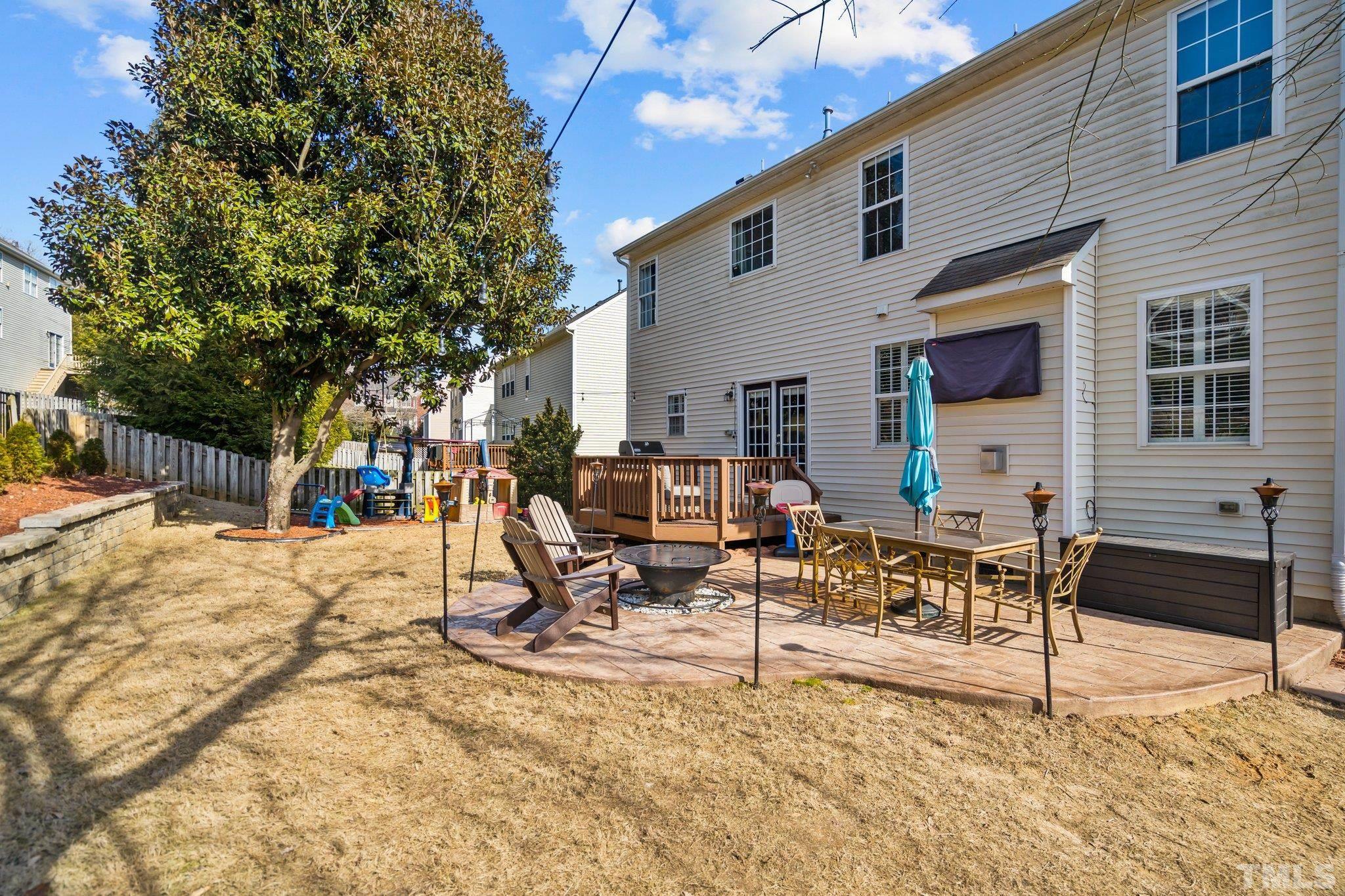 2359 Spruce Shadows Lane Raleigh, NC 27614 - Photo 25 of 34 a view of a house with backyard porch and sitting area