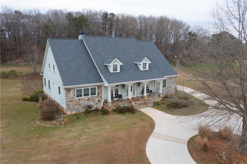1331 Barrows Grove Road Madison, GA 30650 - Photo 33 of 47 a aerial view of a house with a yard
