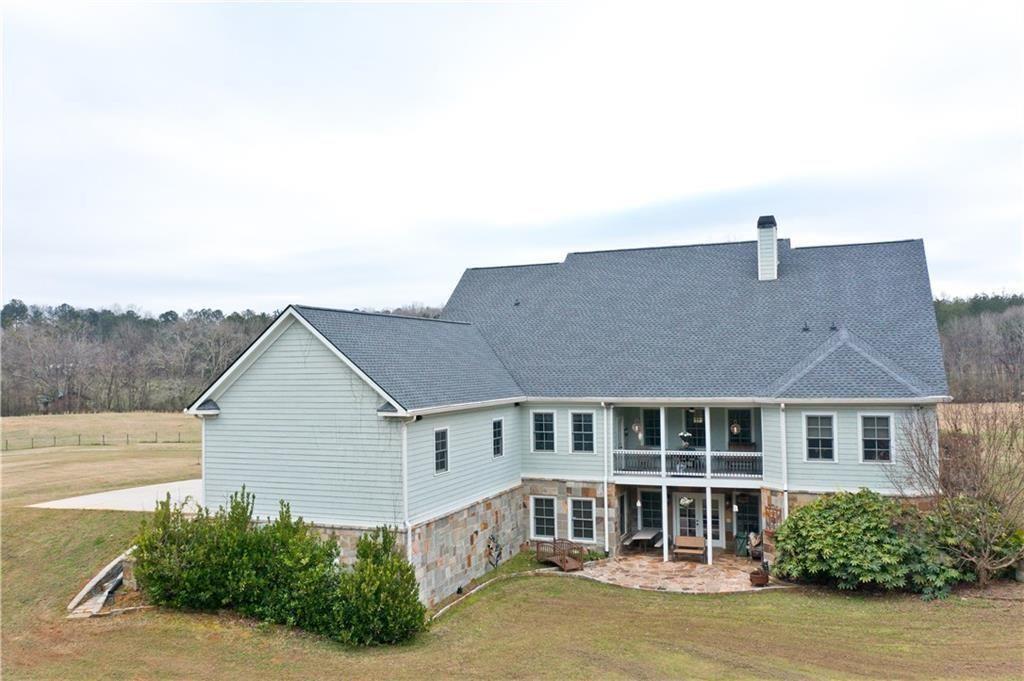 1331 Barrows Grove Road Madison, GA 30650 - Photo 45 of 47 a front view of a house with a yard