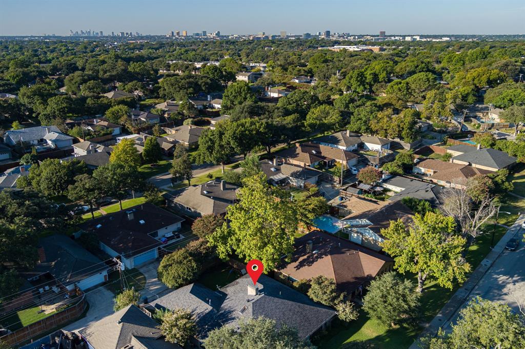 9552 Timberleaf Drive Dallas, TX 75243 - Photo 33 of 38 an aerial view of a houses with a yard