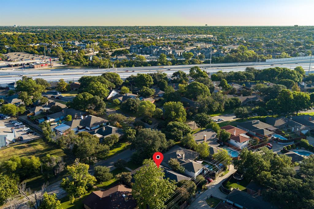 9552 Timberleaf Drive Dallas, TX 75243 - Photo 35 of 38 a city view with tall buildings