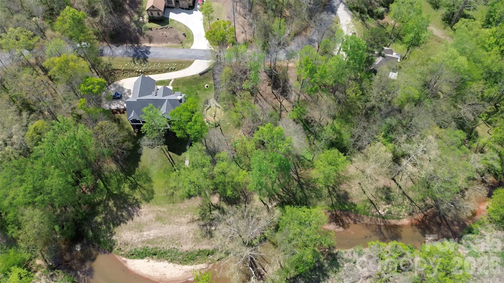 34 West Rambling Creek Drive Tryon, NC 28782 - Photo 4 of 5 an aerial view of residential house with outdoor space and trees all around