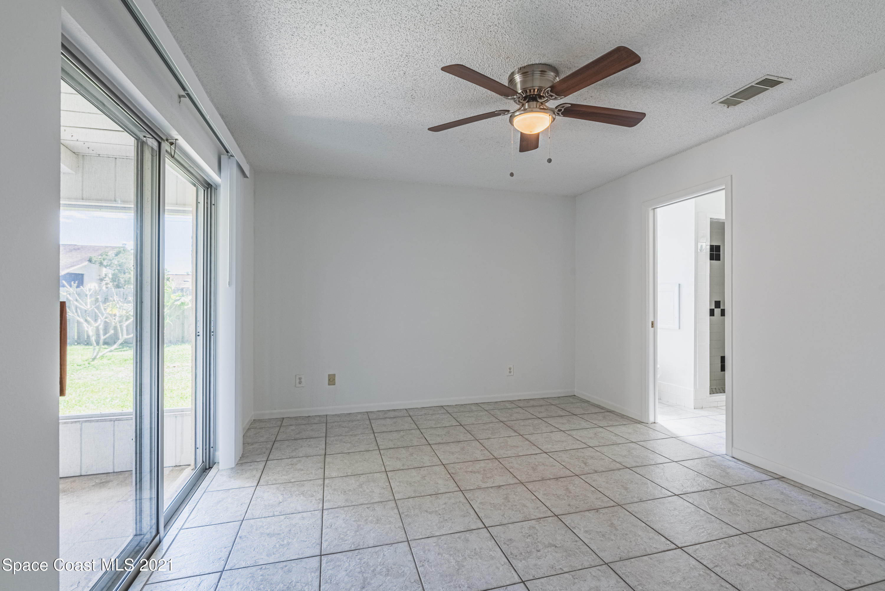 2021 Tallpine Road Melbourne, FL 32935 - Photo 16 of 44 Master Bedroom