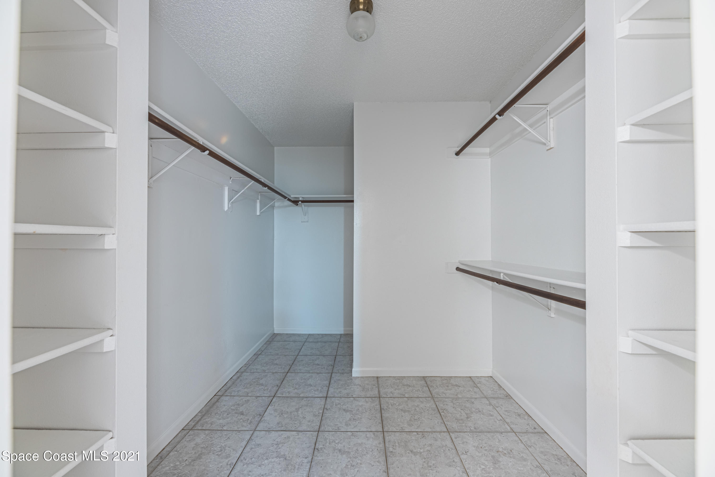 2021 Tallpine Road Melbourne, FL 32935 - Photo 19 of 44 Large Walk in Closet