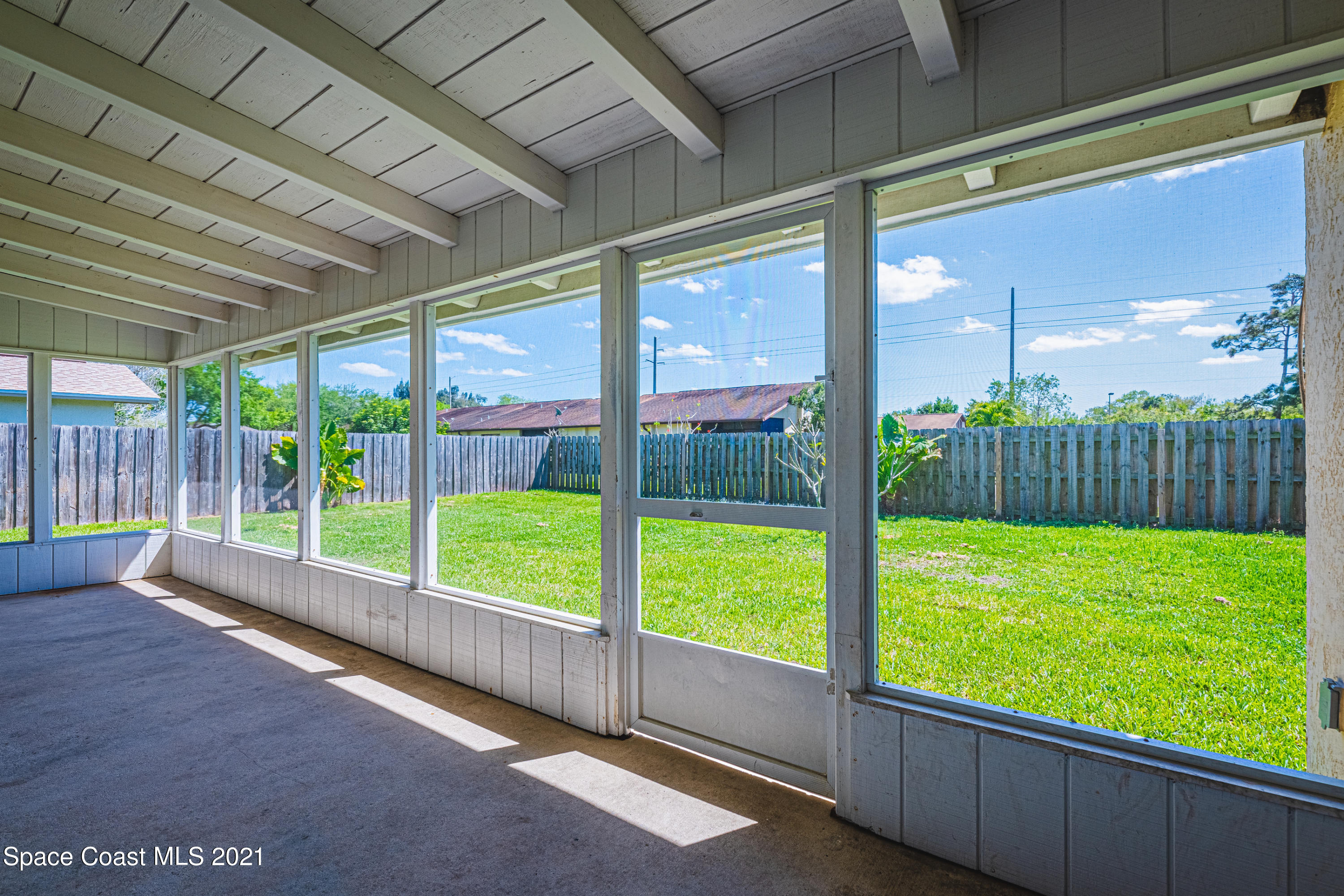 2021 Tallpine Road Melbourne, FL 32935 - Photo 3 of 44 Screened in patio