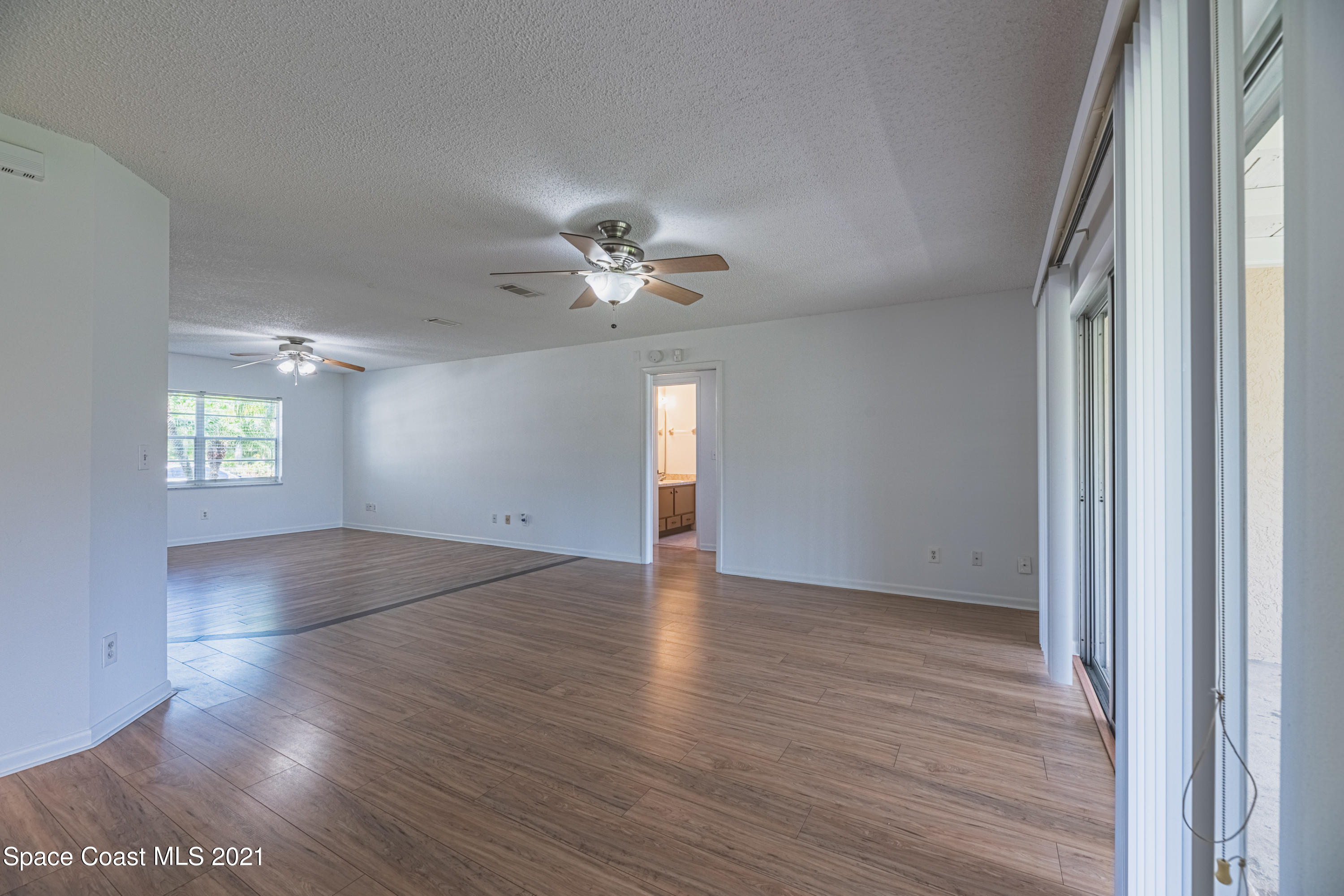 2021 Tallpine Road Melbourne, FL 32935 - Photo 21 of 44 Living room/Dining Room