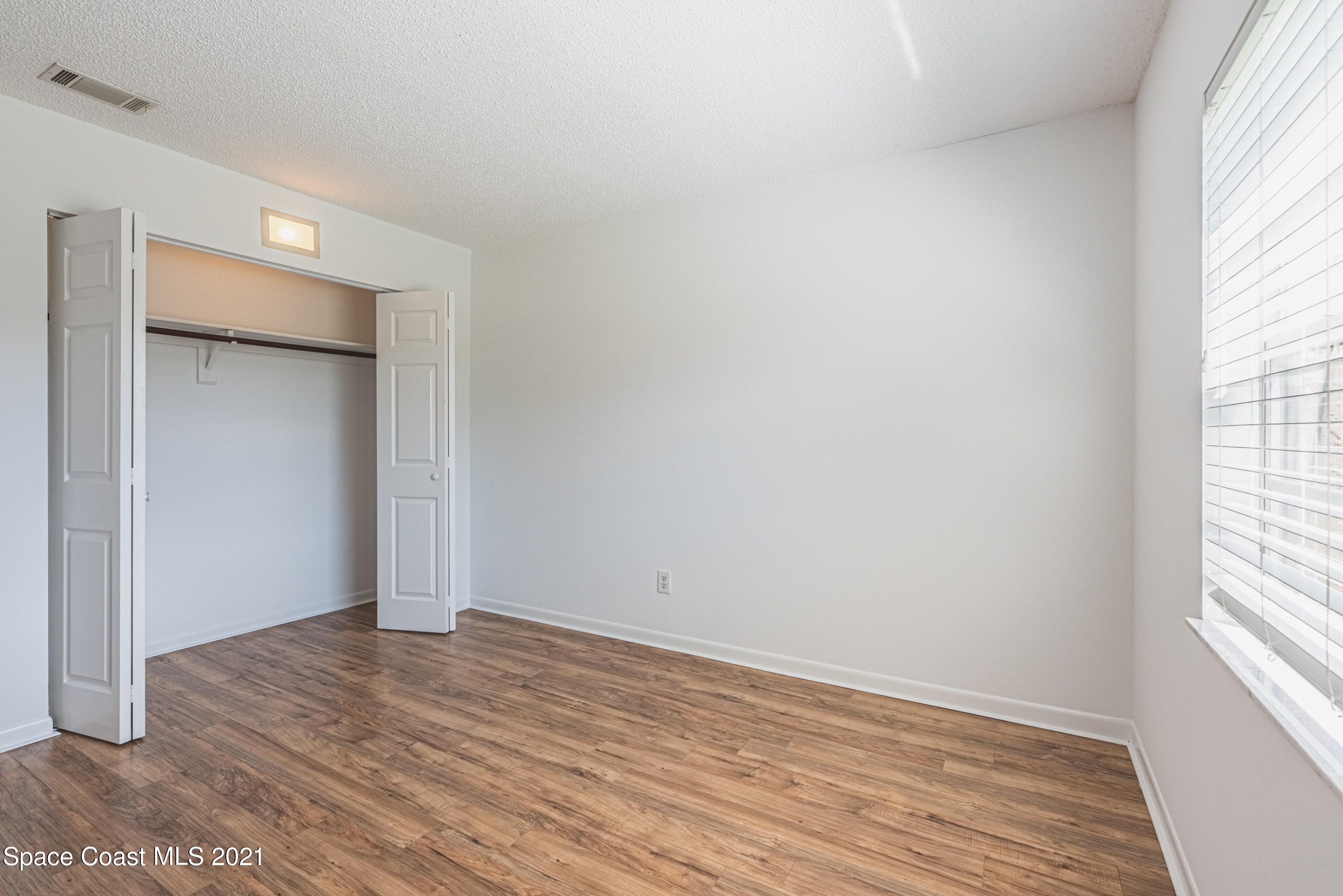 2021 Tallpine Road Melbourne, FL 32935 - Photo 26 of 44 Bedroom 1