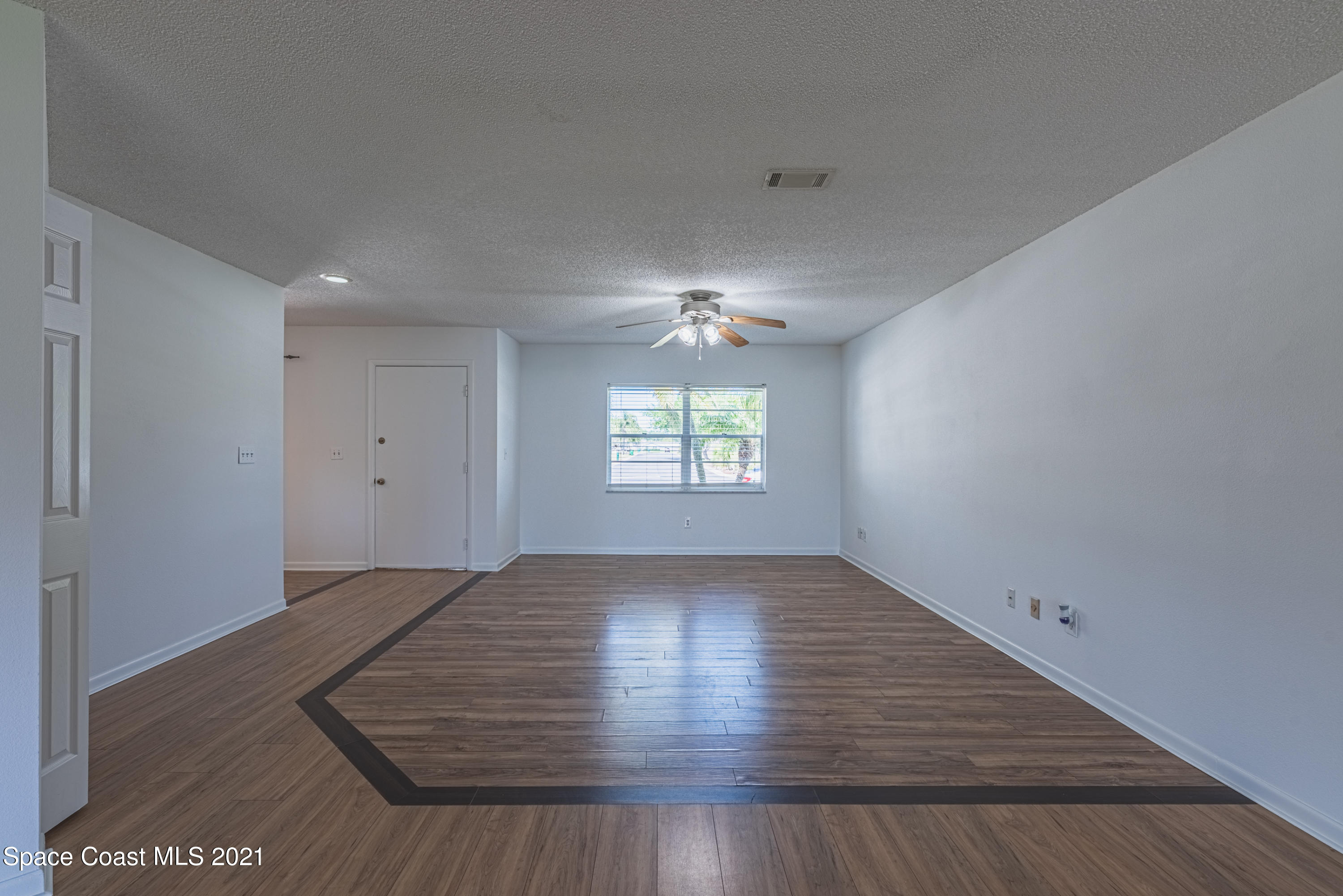 2021 Tallpine Road Melbourne, FL 32935 - Photo 4 of 44 Living Room