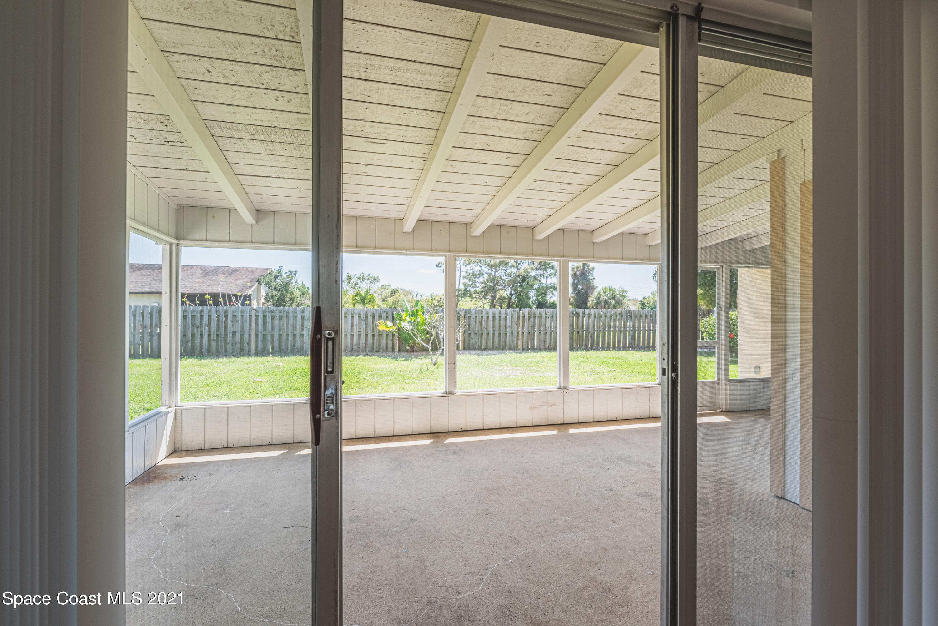 2021 Tallpine Road Melbourne, FL 32935 - Photo 31 of 44 Screened patio
