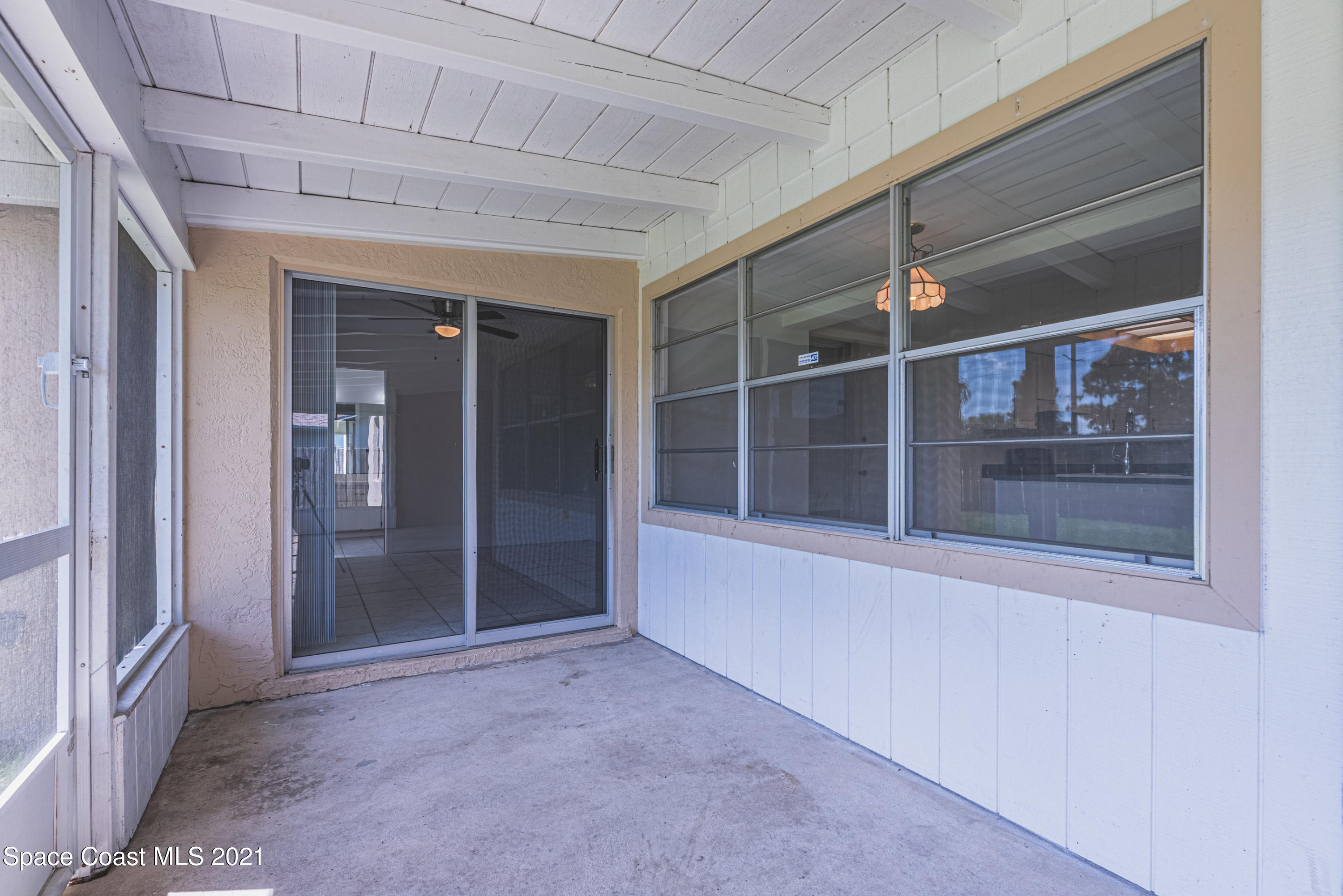 2021 Tallpine Road Melbourne, FL 32935 - Photo 34 of 44 Screened in patio