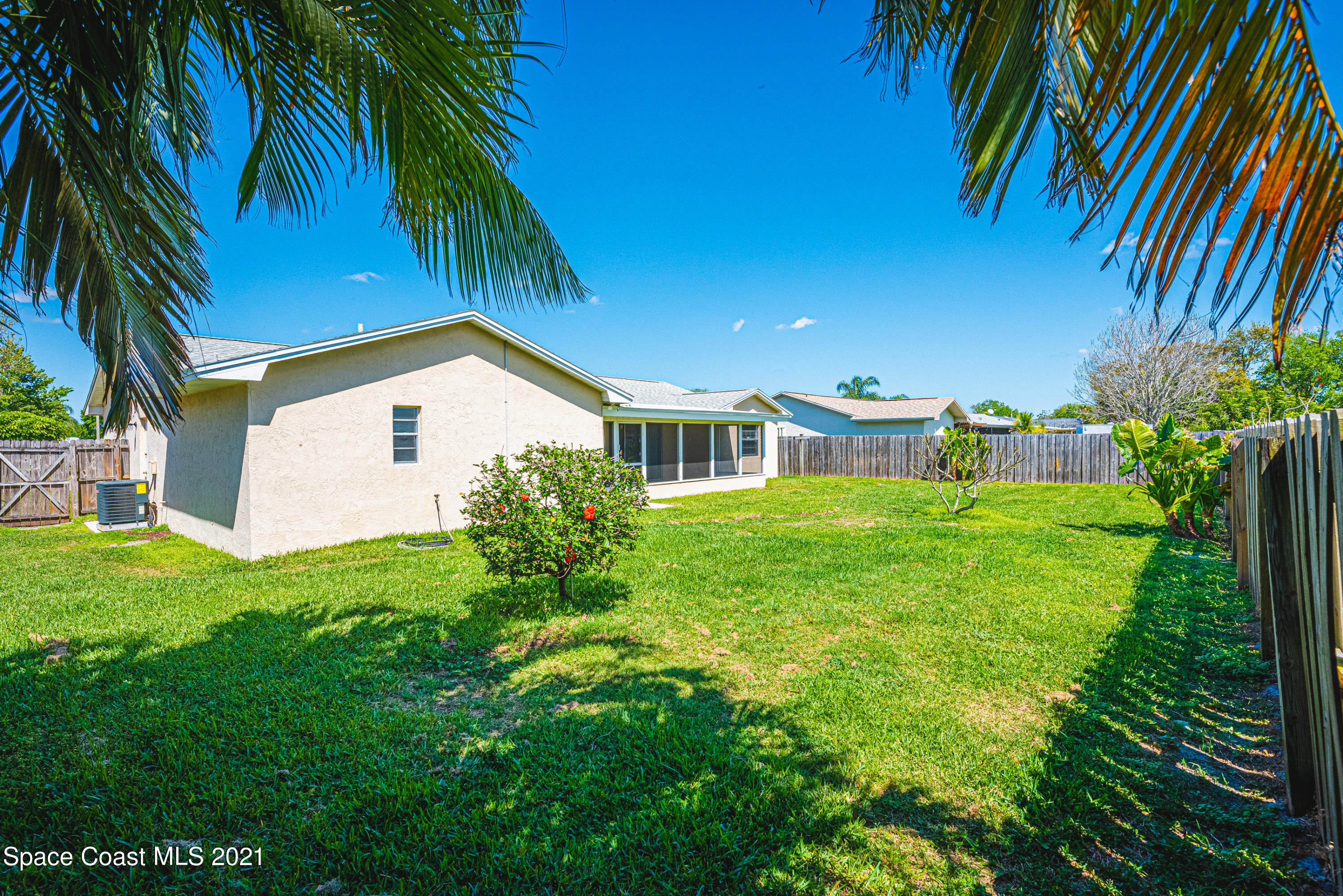 2021 Tallpine Road Melbourne, FL 32935 - Photo 35 of 44 Large back yard