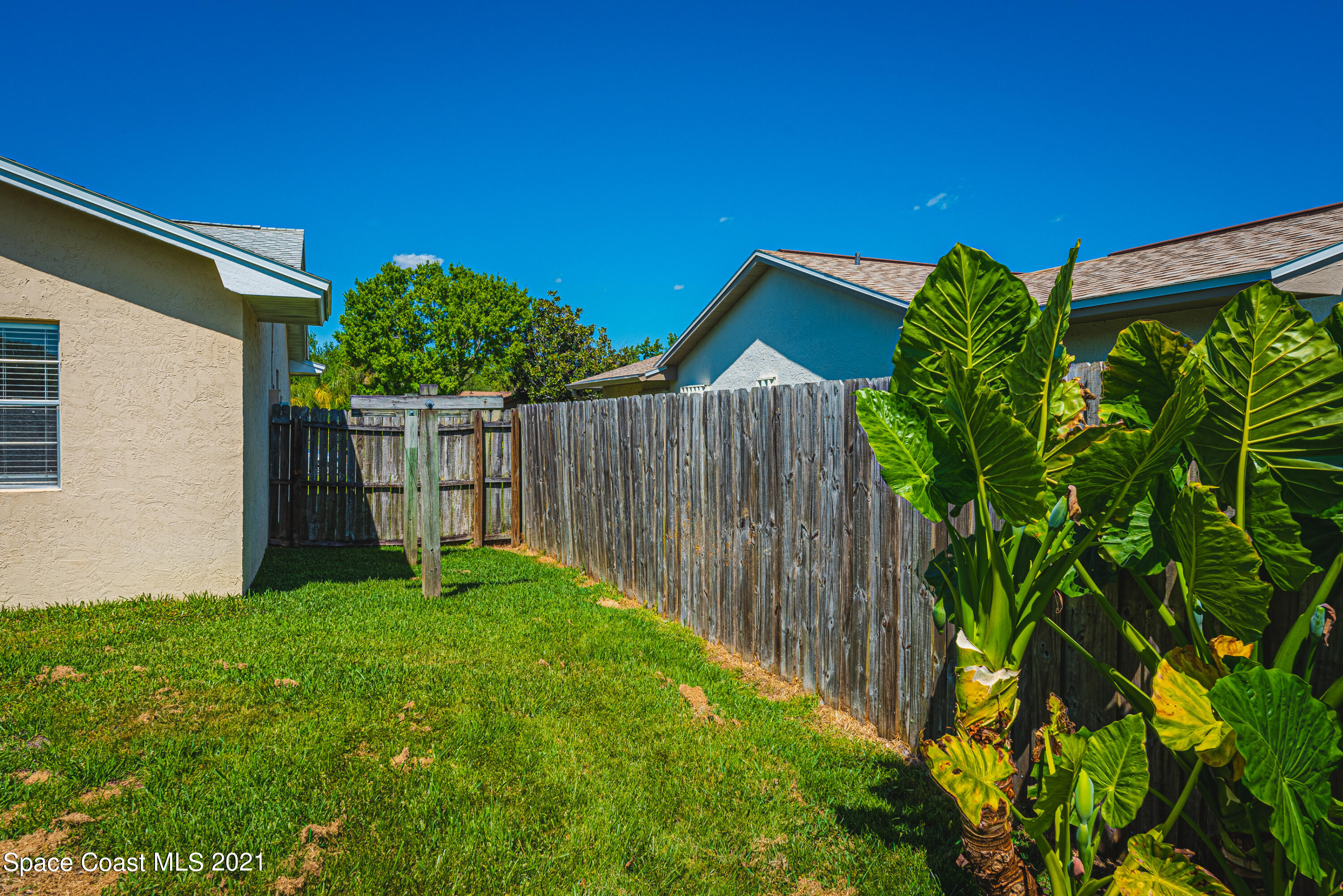 2021 Tallpine Road Melbourne, FL 32935 - Photo 38 of 44 Fenced in Backyard