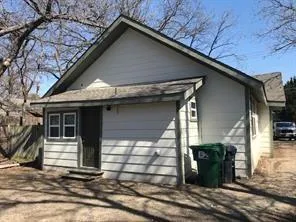 a front view of a house with garage
