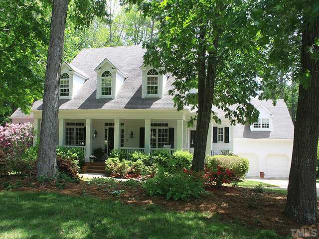 This beautiful low country home is located in one of the most sought after golf course communities in Wake County. Situated on one of the largest lots in the neighborhood, this home offers privacy and elegant living. Exterior Front