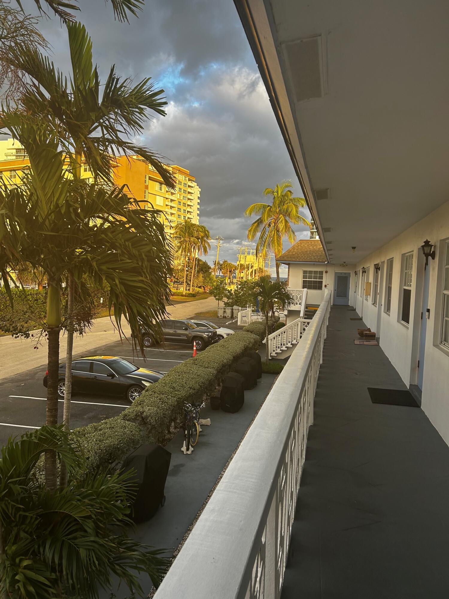 a view of swimming pool from a balcony