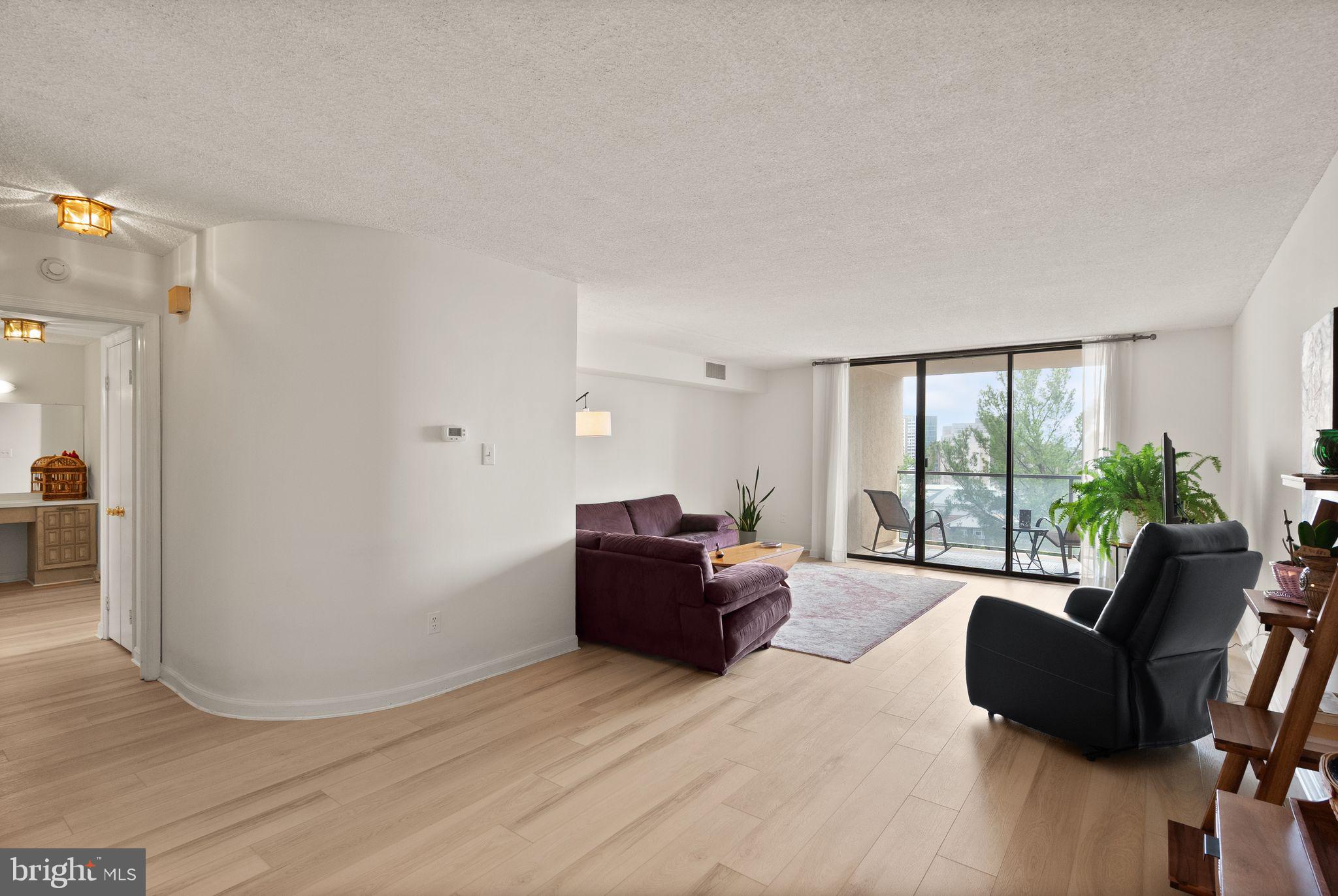 1101 South Arlington Ridge Road, Unit 608 Arlington, VA 22202 - Photo 12 of 53 Open and bright living area