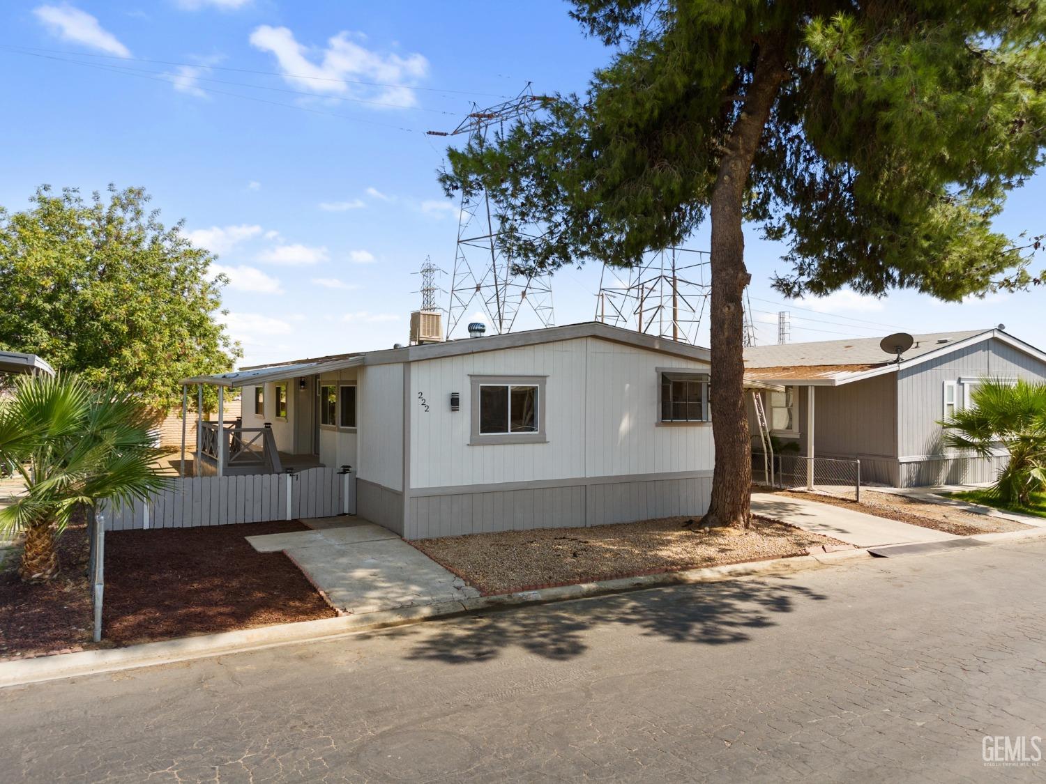 a house with trees in front of it