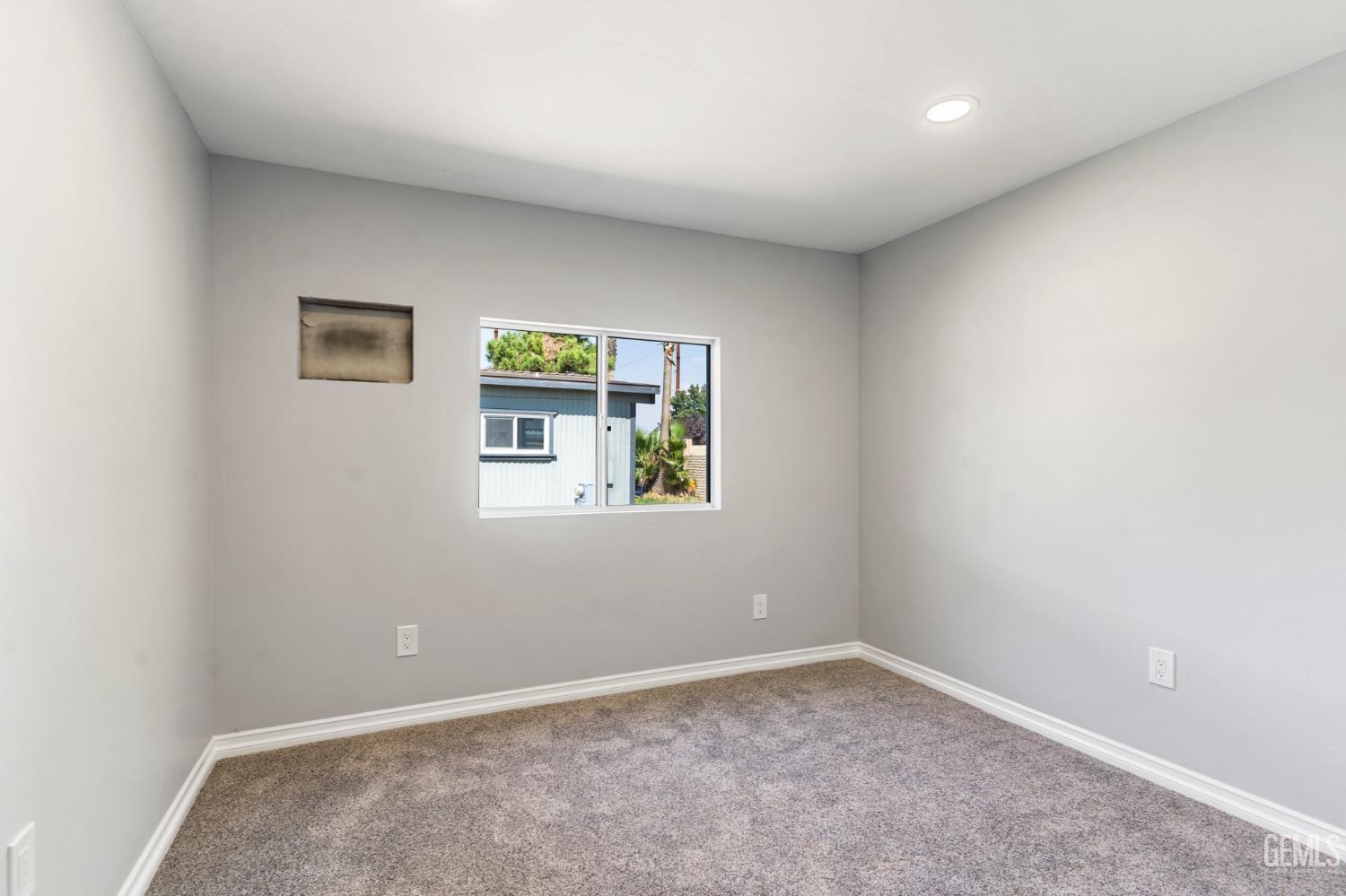 Undisclosed Address Bakersfield, CA 93306 - Photo 16 of 25 an empty room with windows