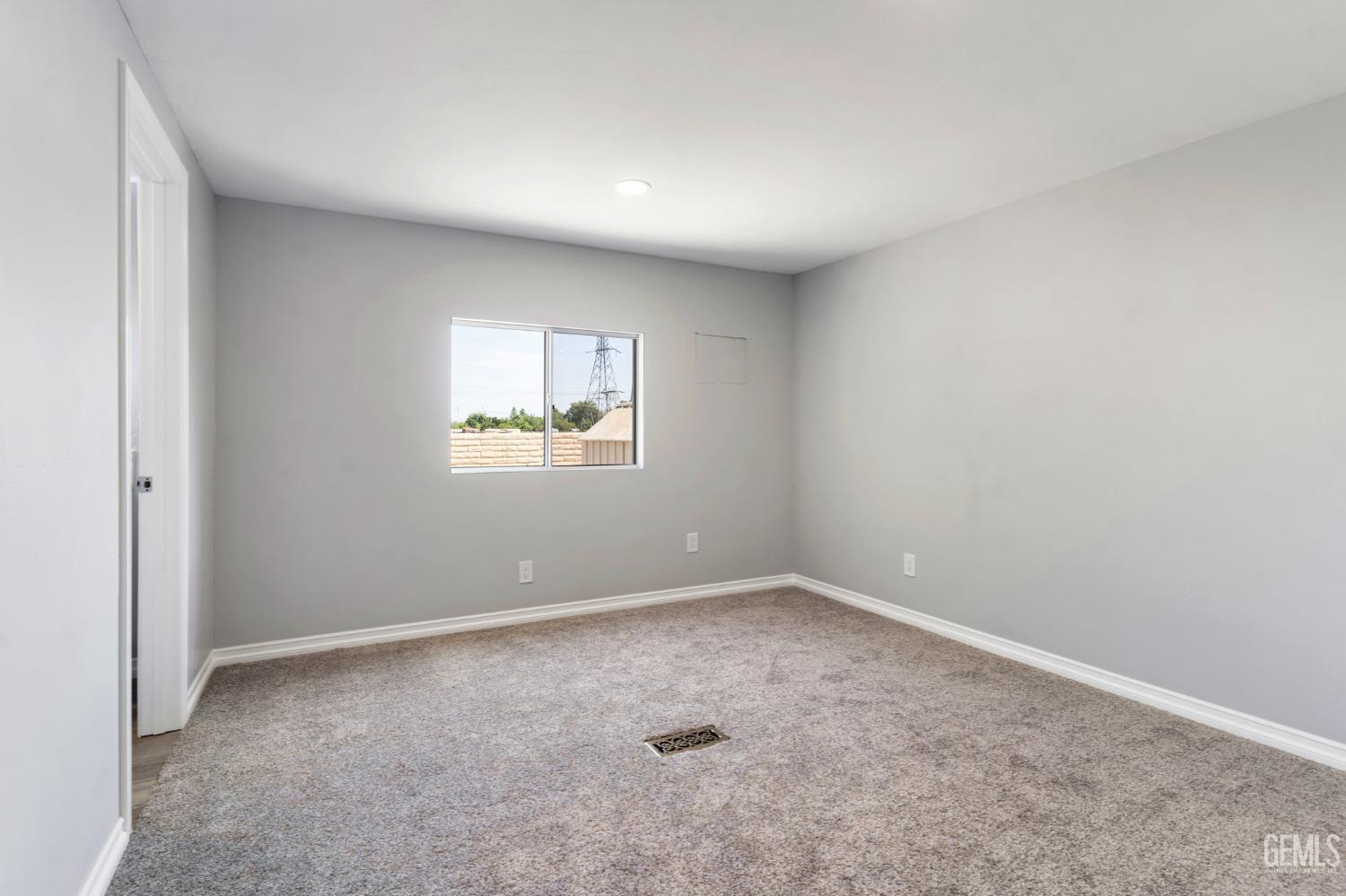 Undisclosed Address Bakersfield, CA 93306 - Photo 18 of 25 a view of an empty room with a window