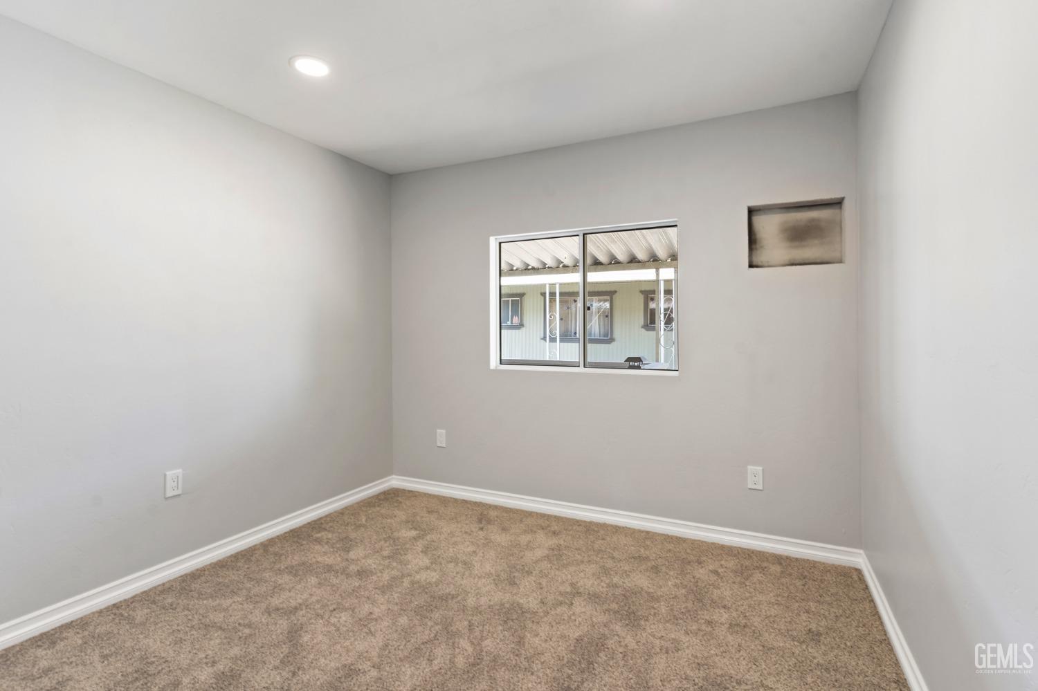 Undisclosed Address Bakersfield, CA 93306 - Photo 19 of 25 an empty room with windows