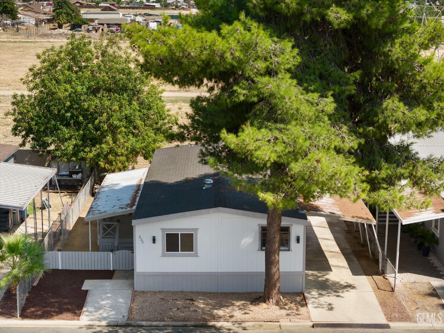 Undisclosed Address Bakersfield, CA 93306 - Photo 23 of 25 a view of a house with a tree